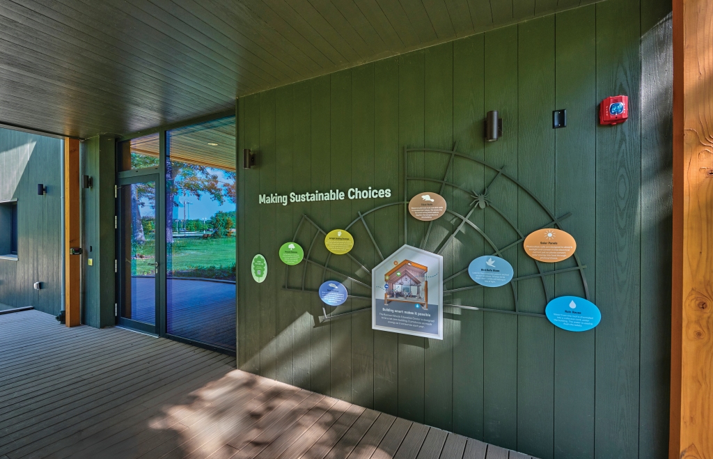 An educational display near the REC’s front door discusses the building’s biomimicry features. Photo © John Weinstein.